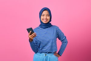 Girl, smartphone, happy — Pkv Games Guide